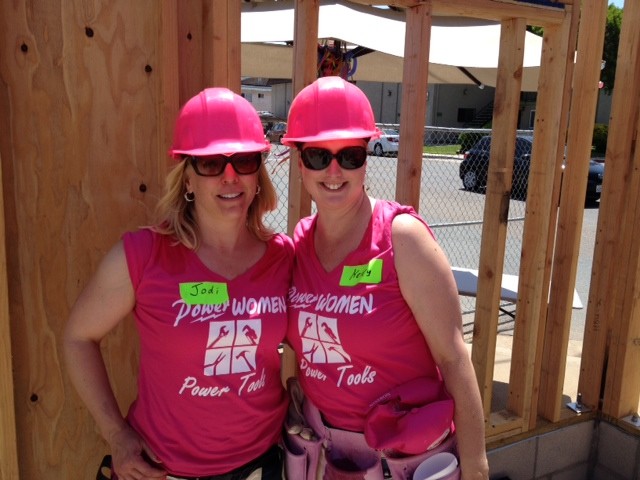Kerry and Jodi of WWM Financial volunteering at a Habitat for Humanity  project. 